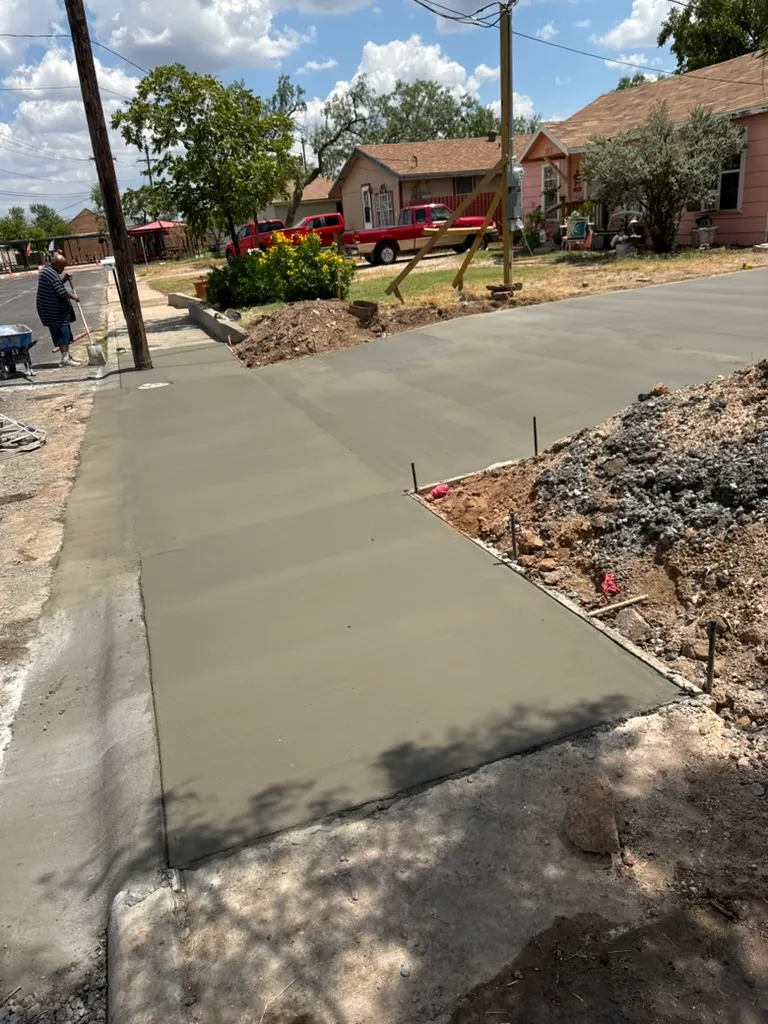 a new concrete sidewalk